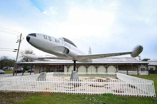 A T-33 Shooting Star is displayed on a pedestal.