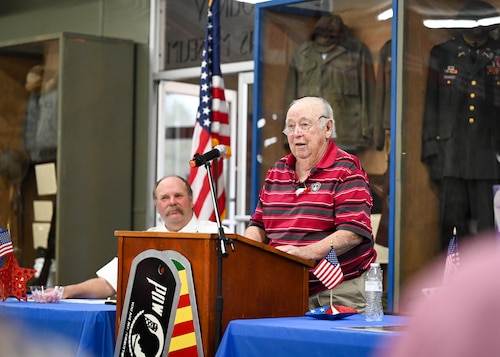Mr. Roberts speaks at a podium.