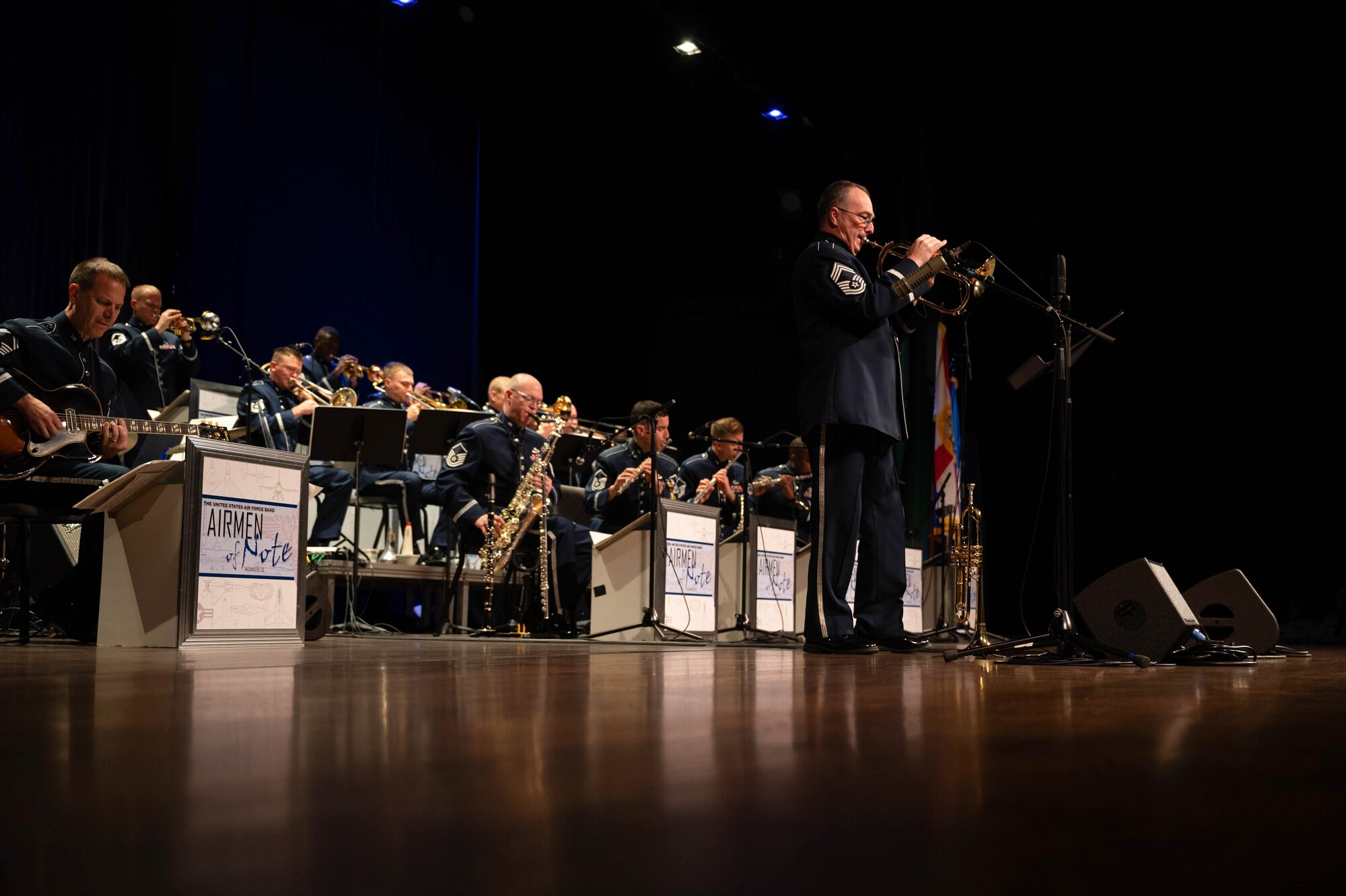 U.S. Air Force Chief Master Sgt. Brian MacDonald, the senior enlisted leader of the Airmen of Note, performs a flugelhorn solo during a show in the Airmen of Note Fall 2024 tour at the State College of Florida Bradenton Campus in Bradenton, Fla., Nov. 12, 2024. The Airmen of Note’s mission, as a part of the U.S. Air Force Band, is to honor those who have served, inspire American citizens to heighten patriotism and service, and to connect the global community on behalf of the U.S. Air Force and the United States. The Airmen of Note consists of 17 active duty musicians and one vocalist stationed at Joint Base Anacostia-Bolling, Washington, D.C. (U.S. Air Force photo by Hayden Hallman)