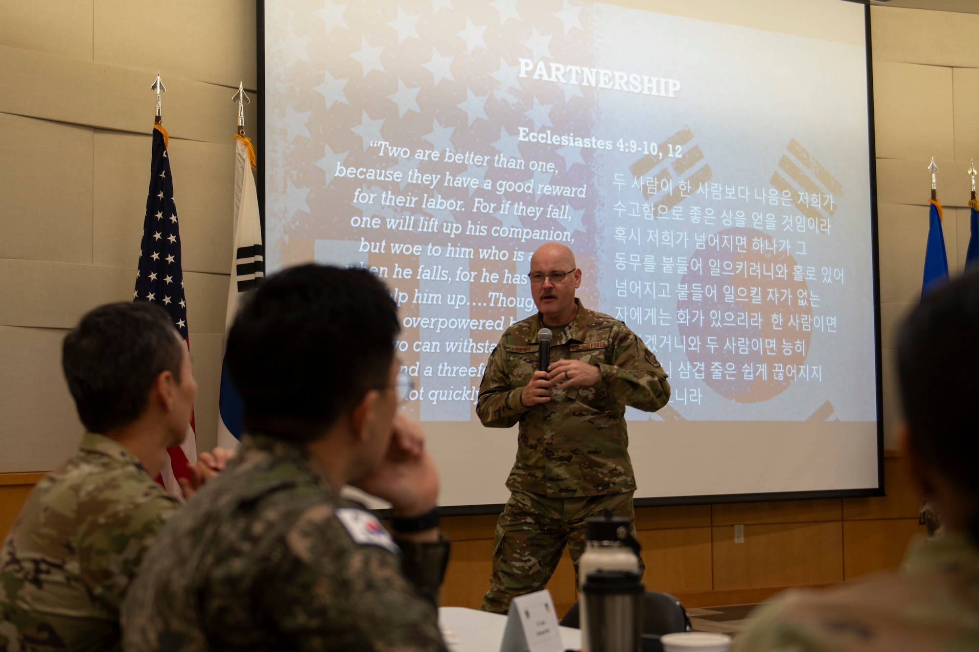 U.S. Air Force Lt. Col James Galyon, 51st Fighter Wing wing chaplain, provides a briefing during a Republic of Korea Air Force and U.S. Air Force  Chaplain Corps Readiness Symposium at Osan Air Base, ROK, Nov. 14, 2024. The symposium invited chaplains from Kunsan AB and ROKAF units to discuss contingency and bilateral operations to improve spiritual readiness across the peninsula. (U.S. Air Force photo by Tech. Sgt. Clayton Lenhardt)