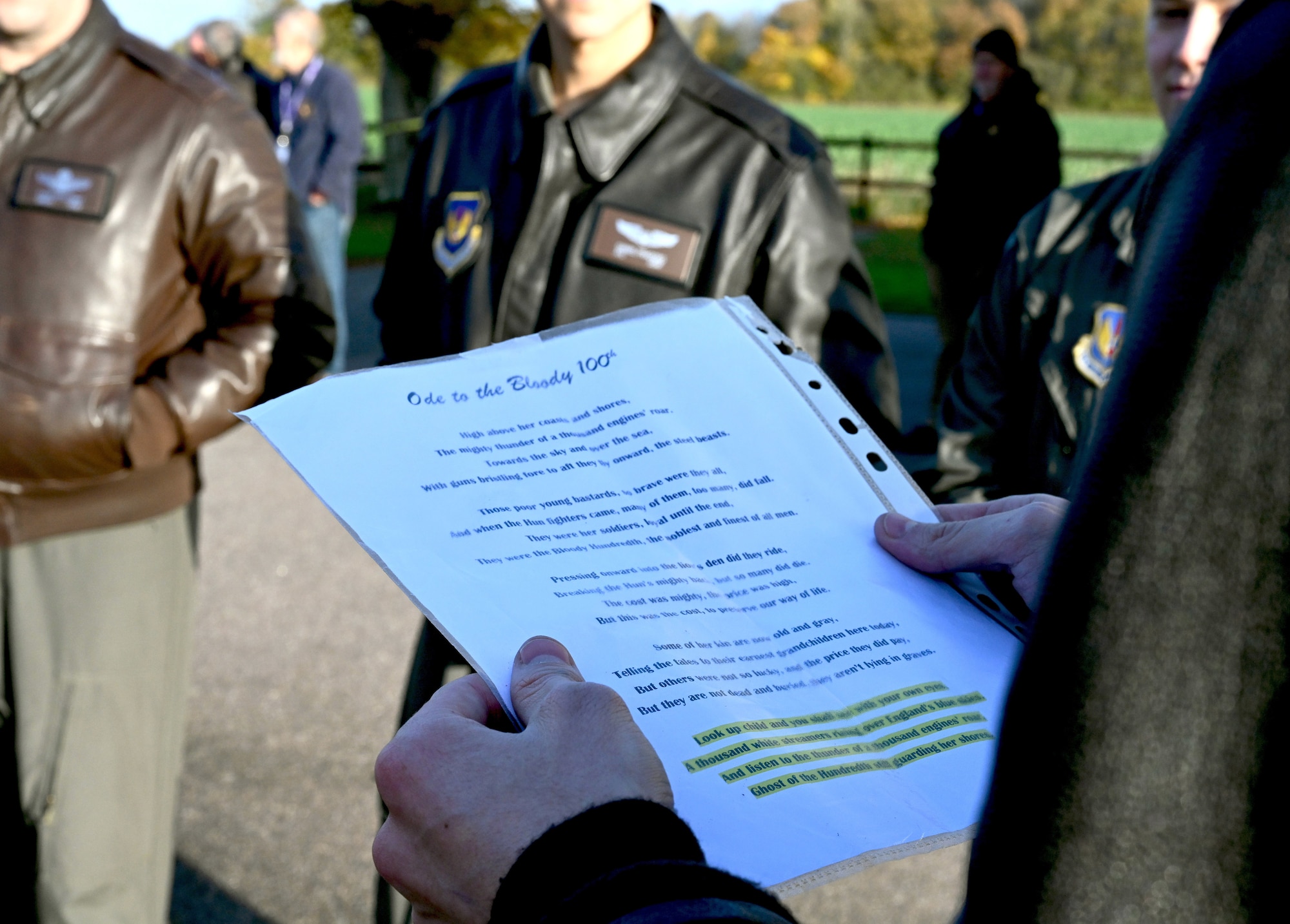 U.S. Air Force Capt. Sean McGinty, 351st Air Refueling Squadron pilot, reads “Ode to the Bloody Hundredth,” a poem written by Benjamin Rosser – grandson of Maj. Frank Murphy, 100th Bomb Group navigator – during a patching ceremony at the 100th Bomb Group Memorial Museum, Thorpe Abbotts, Norfolk, England, Nov. 15, 2024. During the reading of the poem, attendees reflected on the history of their surroundings at the former World War II base, and the heritage of the 100th Air Refueling Wing. (U.S. Air Force photo by Karen Abeyasekere)