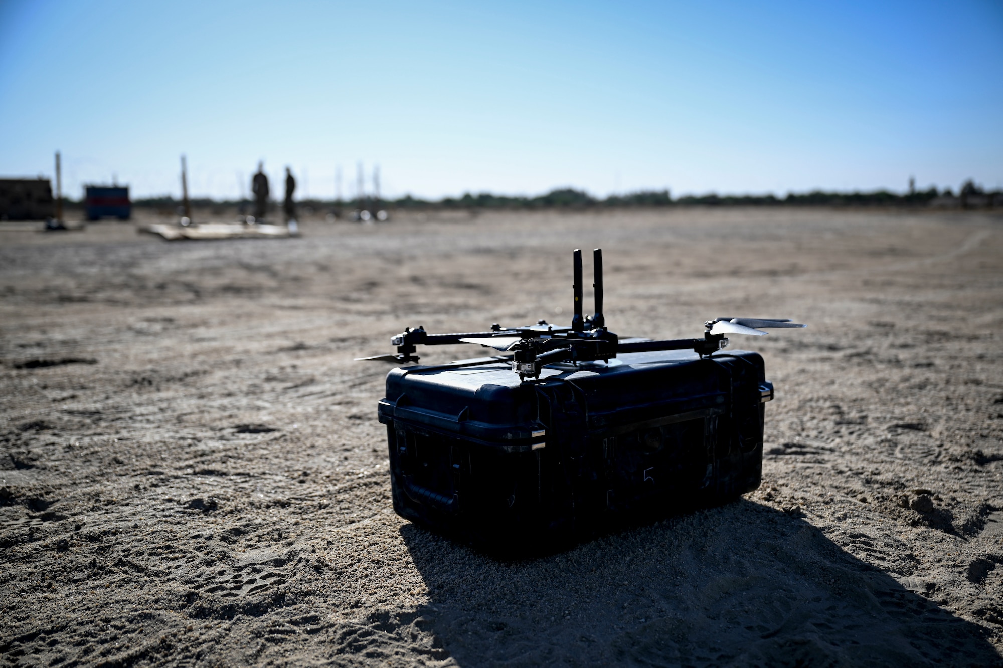 A counter-unmanned aircraft system (C-UAS) is displayed on the ground.