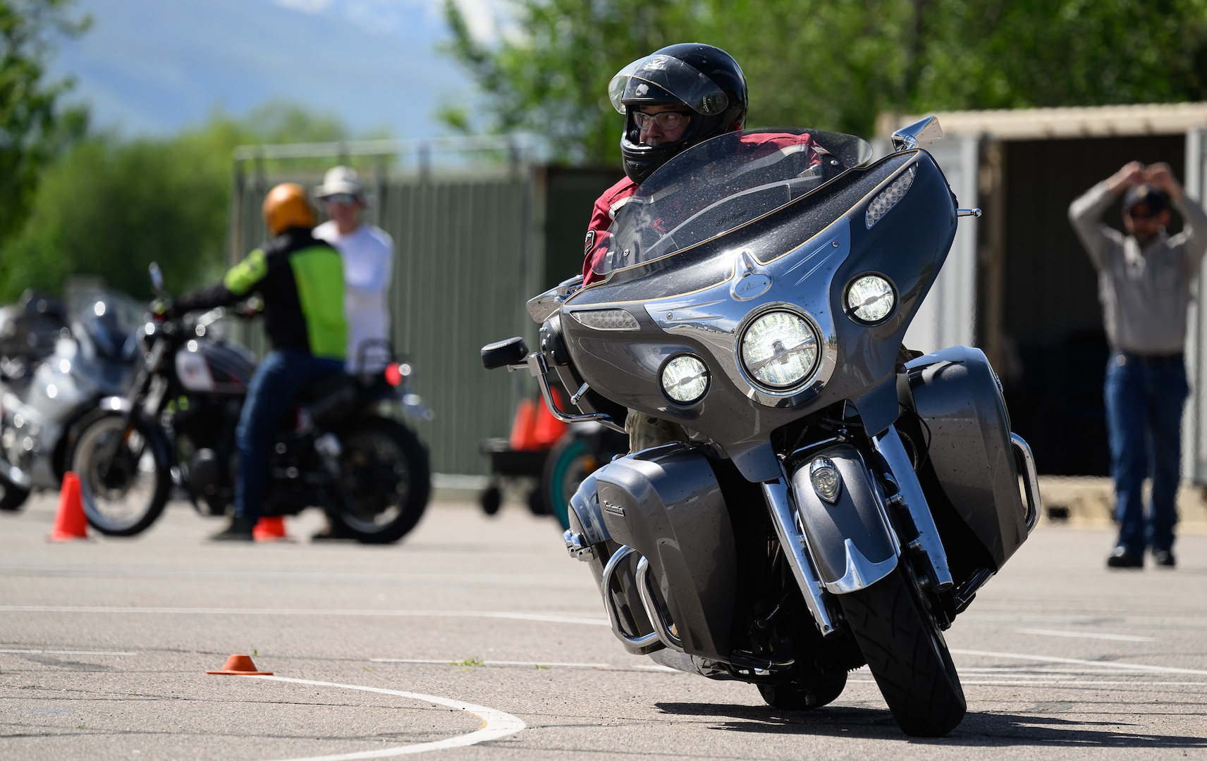 Mike Smith negotiates obstacles during a Basic Rider Course at Hill Air Force Base, Utah, May 26, 2023. The 75th Air Base Wing safety office maintains a SharePoint that provides motorcyclists with information and resources regarding safety, requirements and training for anyone with base access. (U.S. Air Force photo by R. Nial Bradshaw)