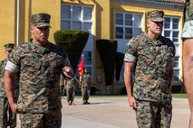 U.S. Marine Corps Sgt. Maj. Carlos Aguilera, the outgoing Sergeant Major of Headquarters and Service Battalion, Marine Corps Recruit Depot San Diego, left, and Sgt. Maj. Thomas Bachman, the oncoming Sergeant Major of H&S Bn, MCRD San Diego, stand together at a relief and appointment ceremony at Marine Corps Recruit Depot San Diego, California, Oct. 31, 2024. Aguilera relinquished his position to Bachman, who took charge of the Battalion.  (U.S. Marine Corps photo by Cpl. Alexander O. Devereux)