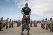 U.S. Marine Corps Martial Arts Instructor, Staff Sgt. Jacob Sinclair, with Support Battalion, Recruit Training Regiment, instructs recruits with Fox Company, 2nd Recruit Training Battalion, before their Marine Corps Martial Arts Program class focusing on bayonet techniques at Marine Corps Recruit Depot San Diego, California, Oct. 28, 2024. MCMAP aims to strengthen the mental and moral resiliency of individual recruits and Marines through realistic combative training, warrior ethos studies, and physical hardening. (U.S. Marine Corps photo by Cpl. Sarah M. Grawcock)