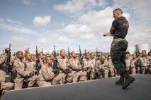 U.S. Marine Corps Martial Arts Instructor, Staff Sgt. Jacob Sinclair, with Support Battalion, Recruit Training Regiment, instructs recruits with Fox Company, 2nd Recruit Training Battalion, during a Marine Corps Martial Arts Program techniques class at Marine Corps Recruit Depot San Diego, California, Oct. 28, 2024. MCMAP aims to strengthen the mental and moral resiliency of individual recruits and Marines through realistic combative training, warrior ethos studies, and physical hardening. (U.S. Marine Corps photo by Cpl. Sarah M. Grawcock)