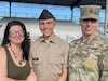 Pfc. Robert Clark (middle) poses with his mother, Amy and his father, Sgt. 1st Class Robert Clark after graduating from Basic Combat Training at (location) on (Date). Pvt. Clark elected to serve as a Religious Affairs Specialist to follow in the footsteps of his father and continue a legacy of service.