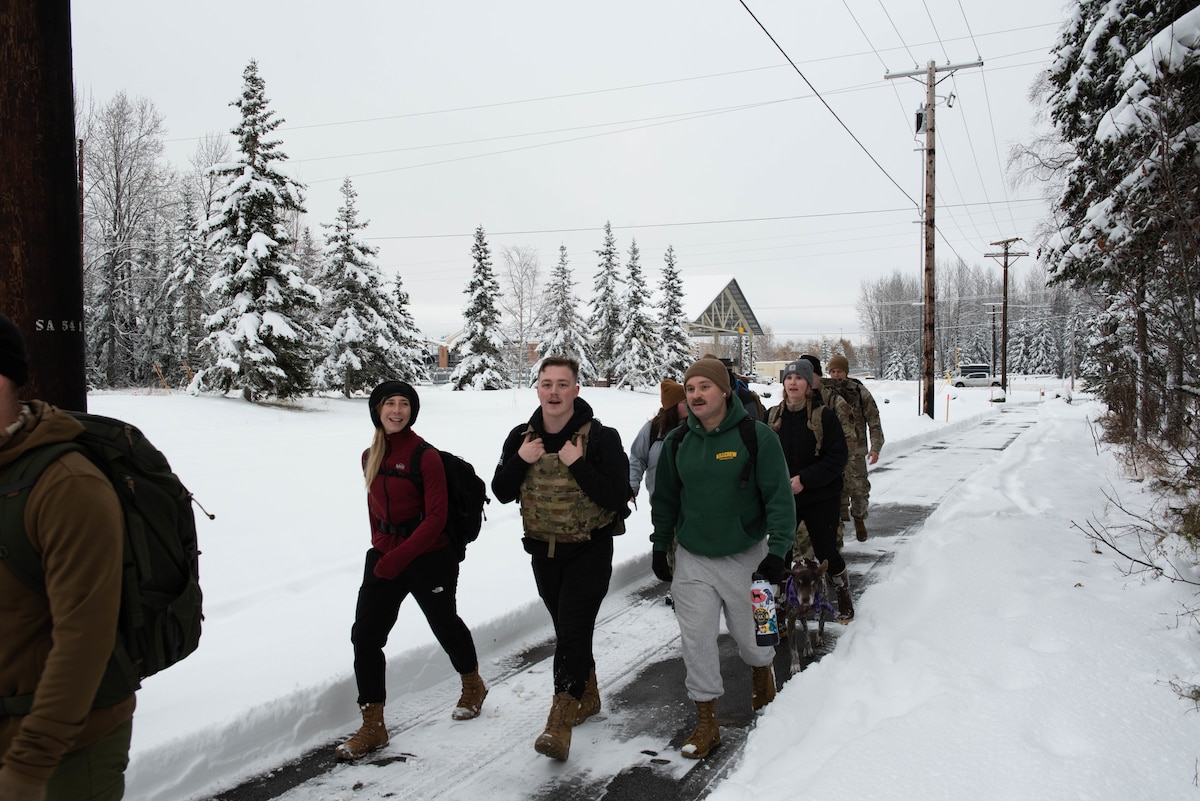 Members of the JBER community participate in the 5K Ruck for a Reason March at Joint Base Elmendorf-Richardson, Alaska, Nov. 1, 2024.