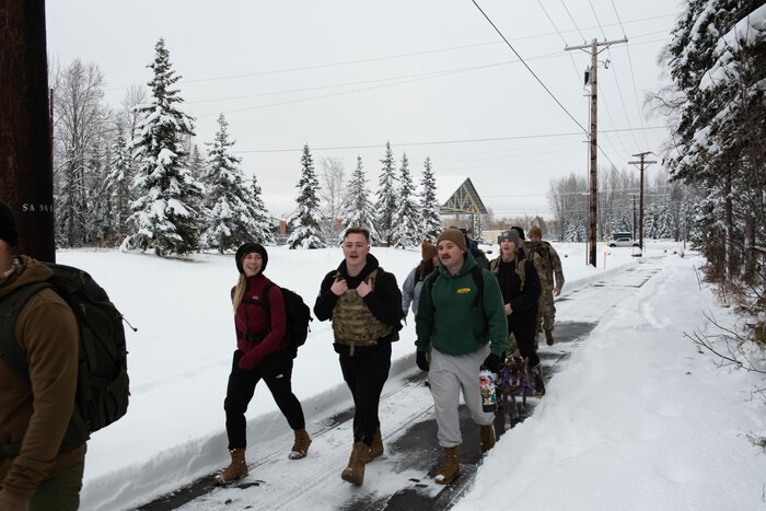 Members of the JBER community participate in the 5K Ruck for a Reason March at Joint Base Elmendorf-Richardson, Alaska, Nov. 1, 2024.
