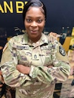 Female Soldier posing in duty uniform.