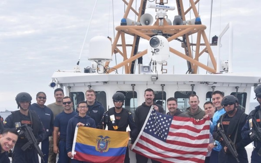 Men standing on boats holding flags.