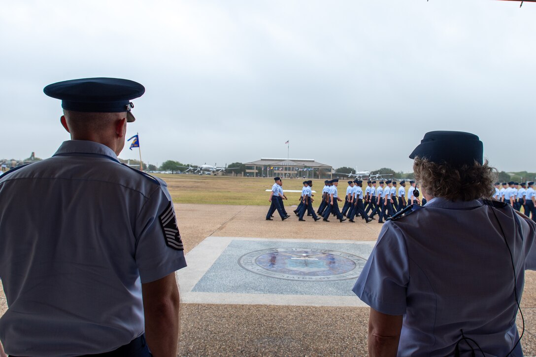 Brig. Gen. Amy Bumgarner, Air Force Office of Special Investigations commander, renders a salute during the Pass in Review at Basic Military Training (BMT) graduation ceremony Nov. 7, 2024, at Joint Base San Antonio-Lackland, Texas. This moment signifies the completion of training and official transition into active military service for these Airmen and Guardians. (U.S. Air Force photo by Thomas Brading)
