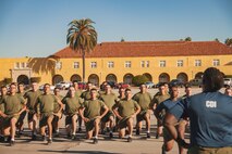 New U.S. Marines with Mike Company, 3rd Recruit Training Battalion, conduct dynamic warm-ups prior to the company motivational run at Marine Corps Recruit Depot San Diego, California, Nov. 14, 2024. The company motivational run is a three-mile cadence run conducted around the Depot and is the last physical training event the Marines will conduct before they graduate from MCRD San Diego. The event is also the first time friends and families will see their newly transformed Marines. (U.S. Marine Corps photo by Lance Cpl. Janell B. Alvarez)