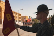 U.S. Marines Sgt. Jordan Beaner, drill instructor with Bravo Company, 1st Recruit Training Battalion, stands during the company motivational run for Mike Company, 3rd Recruit Training Battalion, at Marine Corps Recruit Depot San Diego, California, Nov. 14, 2024. The company motivational run is a three-mile cadence run conducted around the Depot and is the last physical training event the Marines will conduct before they graduate from MCRD San Diego. The event is also the first time friends and families will see their newly transformed Marines. (U.S. Marine Corps photo by Lance Cpl. Janell B. Alvarez)