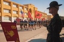 U.S. Marines with Recruit Training Regiment, lead the company motivational run for Mike Company, 3rd Recruit Training Battalion, at Marine Corps Recruit Depot San Diego, California, Nov. 14, 2024. The company motivational run is a three-mile cadence run conducted around the Depot and is the last physical training event the Marines will conduct before they graduate from MCRD San Diego. The event is also the first time friends and families will see their newly transformed Marines. (U.S. Marine Corps photo by Lance Cpl. Janell B. Alvarez)