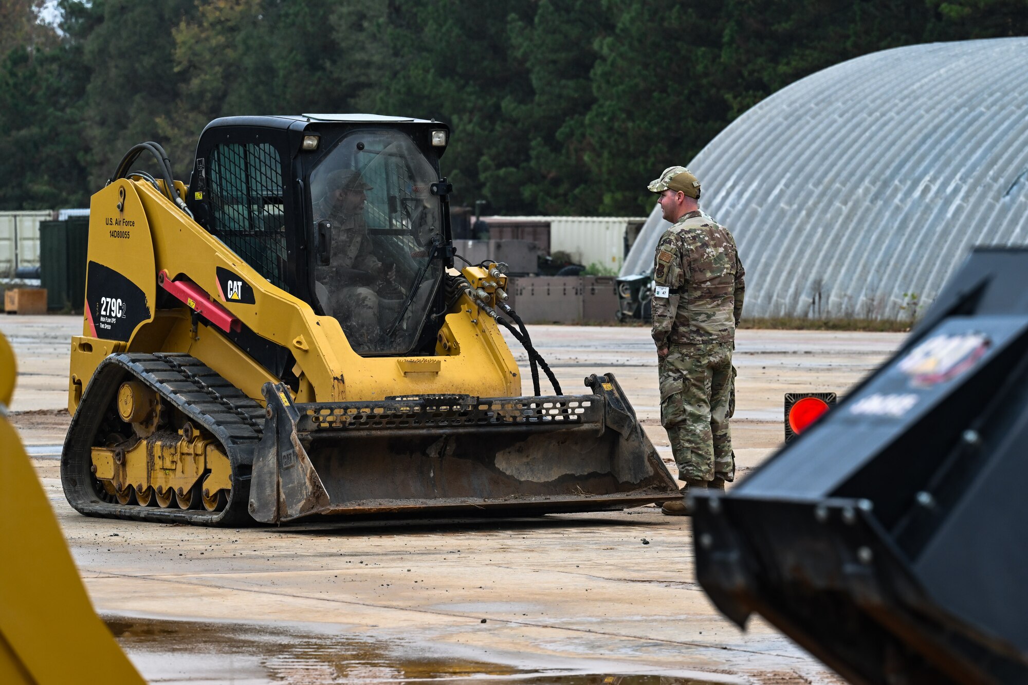 A Citizen Airman assigned to the 910th Civil Engineer Squadron operates a skid steer loader at Dobbins Air Reserve Base, Georgia, Nov. 14, 2024.