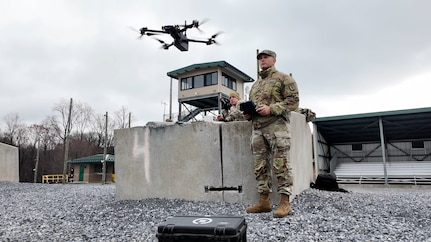 The capabilities of the 166th Regiment - Regional Training Institute's 1st and 2nd Battalions melded during a unique artillery live-fire training exercise Nov. 15, 2024 at Fort Indiantown Gap, Pa. Forward observers with 1st Battalion used several models of Small Unmanned Aircraft Systems to acquire targeting data of identified targets. This data was used to submit a call for fire to instructors and students with 2nd Battalion, who engaged the targets with artillery fire using M119, M777, and M109A6 howitzers.