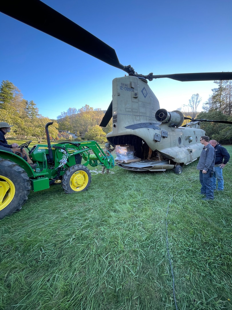 Oklahoma National Guard members with 90th Troop Command’s Detachment 1, Bravo Company, 2nd Battalion, 149th Aviation Regiment, provided relief efforts for North Carolina residents following the aftermath of Hurricane Helene. The North Carolina Department of Emergency Management submitted an Emergency Management Assistance Compact (EMAC) request to the Oklahoma National Guard for one CH-47 Chinook helicopter with hoist equipment and aircrew to support Task Force South in Greenville, South Carolina. The helicopter and its crew of Oklahoma Guardsmen arrived in Greenville, South Carolina on October 6, 2024. While on ground, the team moved more than 97,000 pounds of equipment including generators, fuel, hay, food, water, clothing, blankets and more over the course of 18 days. (Oklahoma National Guard photo by Staff Sgt. Ivan Diaz)