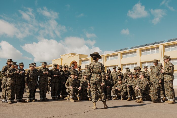 U.S. Marine Corps Staff Sgt. Johana Tucubal, a drill instructor with Echo Company, 2nd Recruit Training Battalion, speaks to recruits during a post exchange and haircut call at Marine Corps Recruit Depot San Diego, California, Nov. 18, 2024. Recruits are allowed to go to the PX to buy necessary supplies and receive haircuts weekly during their time at MCRD San Diego in order to maintain a uniform appearance and promote good hygiene throughout recruit training. (U.S. Marine Corps photo by Lance Cpl. Janell B. Alvarez)