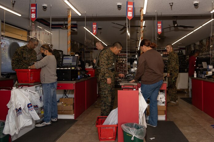 U.S. Marine Corps recruits with Echo Company, 2nd Recruit Training Battalion, purchase items during a post exchange and haircut call at Marine Corps Recruit Depot San Diego, California, Nov. 18, 2024. Recruits are allowed to go to the PX to buy necessary supplies and receive haircuts weekly during their time at MCRD San Diego in order to maintain a uniform appearance and promote good hygiene throughout recruit training. (U.S. Marine Corps photo by Lance Cpl. Janell B. Alvarez)