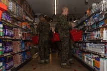 U.S. Marine Corps recruits with Echo Company, 2nd Recruit Training Battalion, search for items during a post exchange and haircut call at Marine Corps Recruit Depot San Diego, California, Nov. 18, 2024. Recruits are allowed to go to the PX to buy necessary supplies and receive haircuts weekly during their time at MCRD San Diego in order to maintain a uniform appearance and promote good hygiene throughout recruit training. (U.S. Marine Corps photo by Lance Cpl. Janell B. Alvarez)