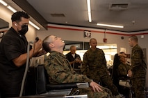 U.S. Marine Corps Recruit Chris Kendall with Echo Company, 2nd Recruit Training Battalion, receives his weekly haircut during a post exchange and haircut call at Marine Corps Recruit Depot San Diego, California, Nov. 18, 2024. Recruits are allowed to go to the PX to buy necessary supplies and receive haircuts weekly during their time at MCRD San Diego in order to maintain a uniform appearance and promote good hygiene throughout recruit training. (U.S. Marine Corps photo by Lance Cpl. Janell B. Alvarez)