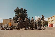 U.S. Marine Corps Recruit William Bennett with Echo Company, 2nd Recruit Training Battalion, reviews knowledge with the recruits during a post exchange and haircut call at Marine Corps Recruit Depot San Diego, California, Nov. 18, 2024. Recruits are allowed to go to the PX to buy necessary supplies and receive haircuts weekly during their time at MCRD San Diego in order to maintain a uniform appearance and promote good hygiene throughout recruit training. (U.S. Marine Corps photo by Lance Cpl. Janell B. Alvarez)