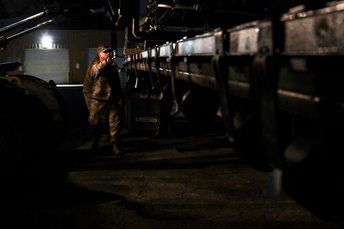 A Citizen Airman assigned to the 910th Civil Engineer Squadron assists in loading cargo onto a flatbed trailer at Dobbins Air Reserve Base, Georgia, Nov. 16, 2024.