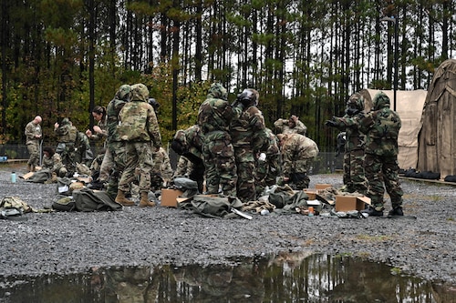 Citizen Airmen assigned to the 910th Airlift Wing practice dawning their mission-oriented protective posture gear at Dobbins Air Reserve Base, Georgia, Nov. 14, 2024.