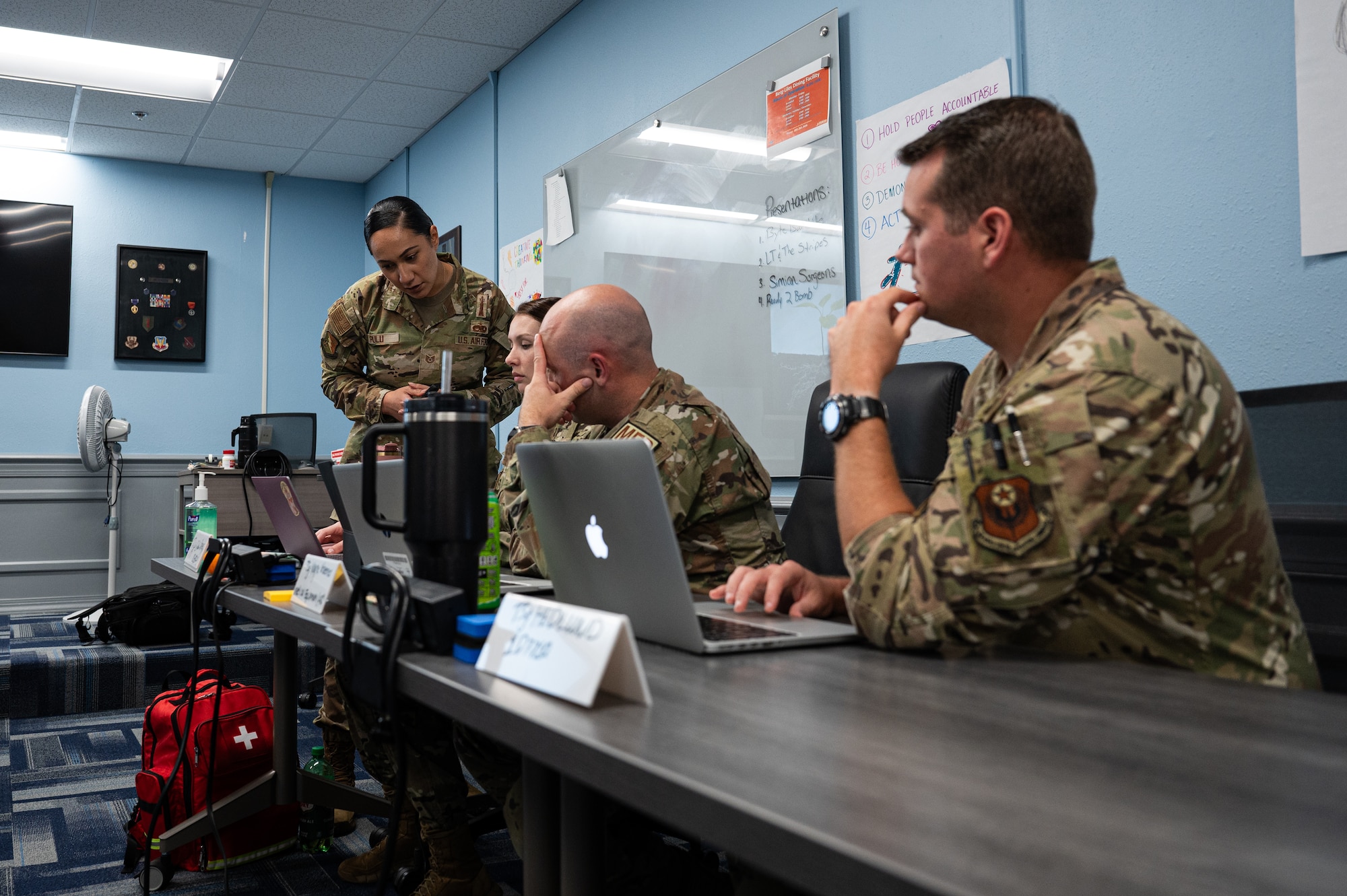 Airey NCOA instructor talks with Airmen