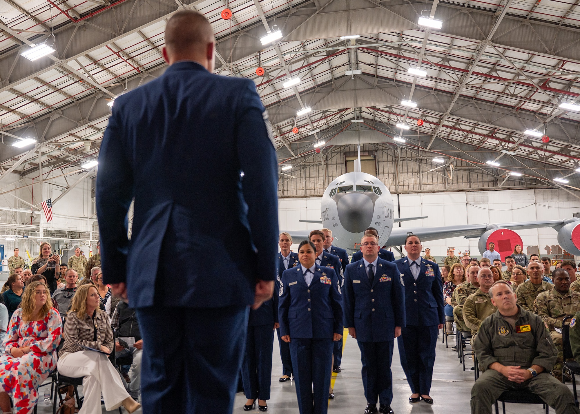 military members stand at attention