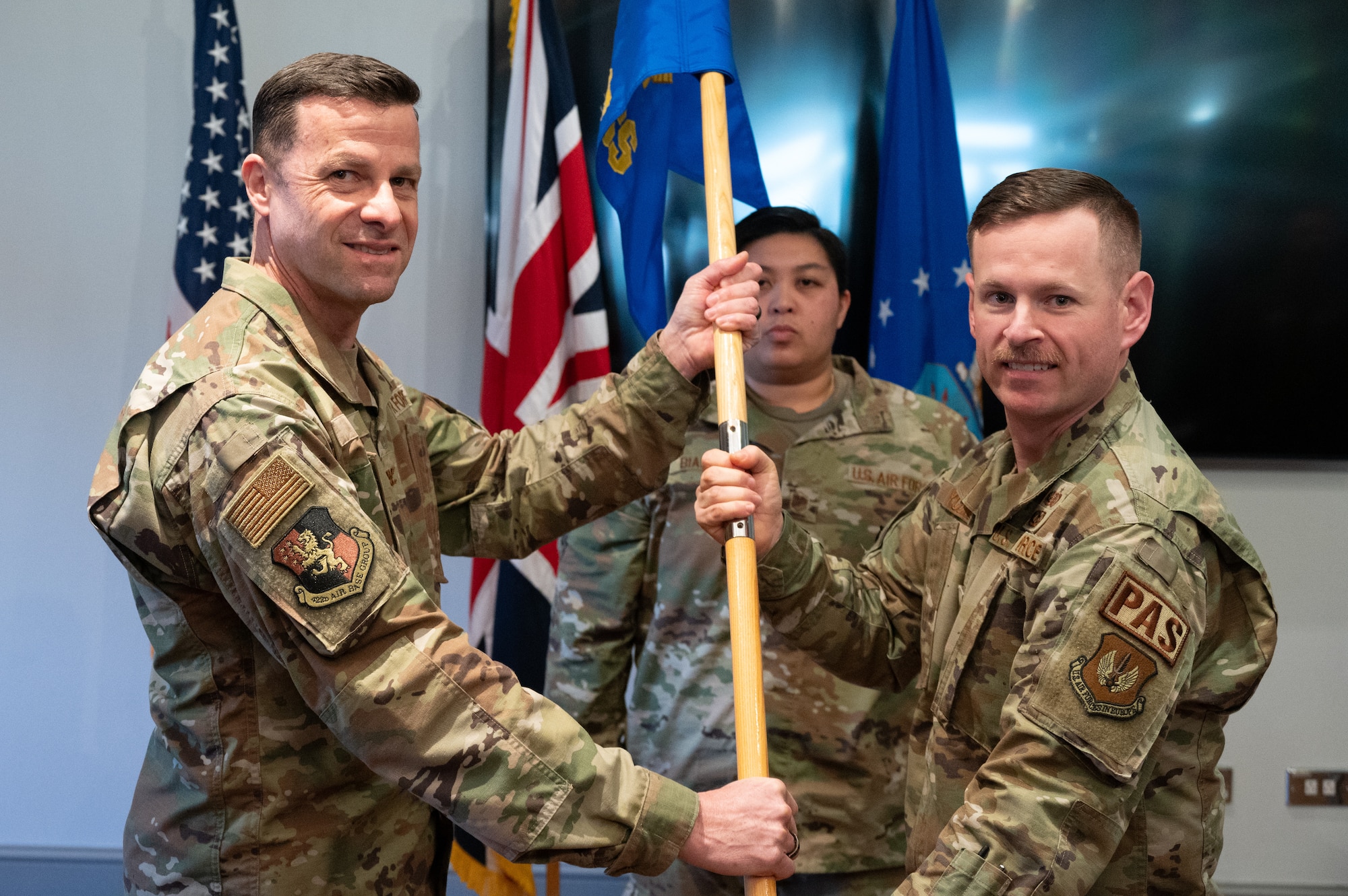 Commanders pass a guidon