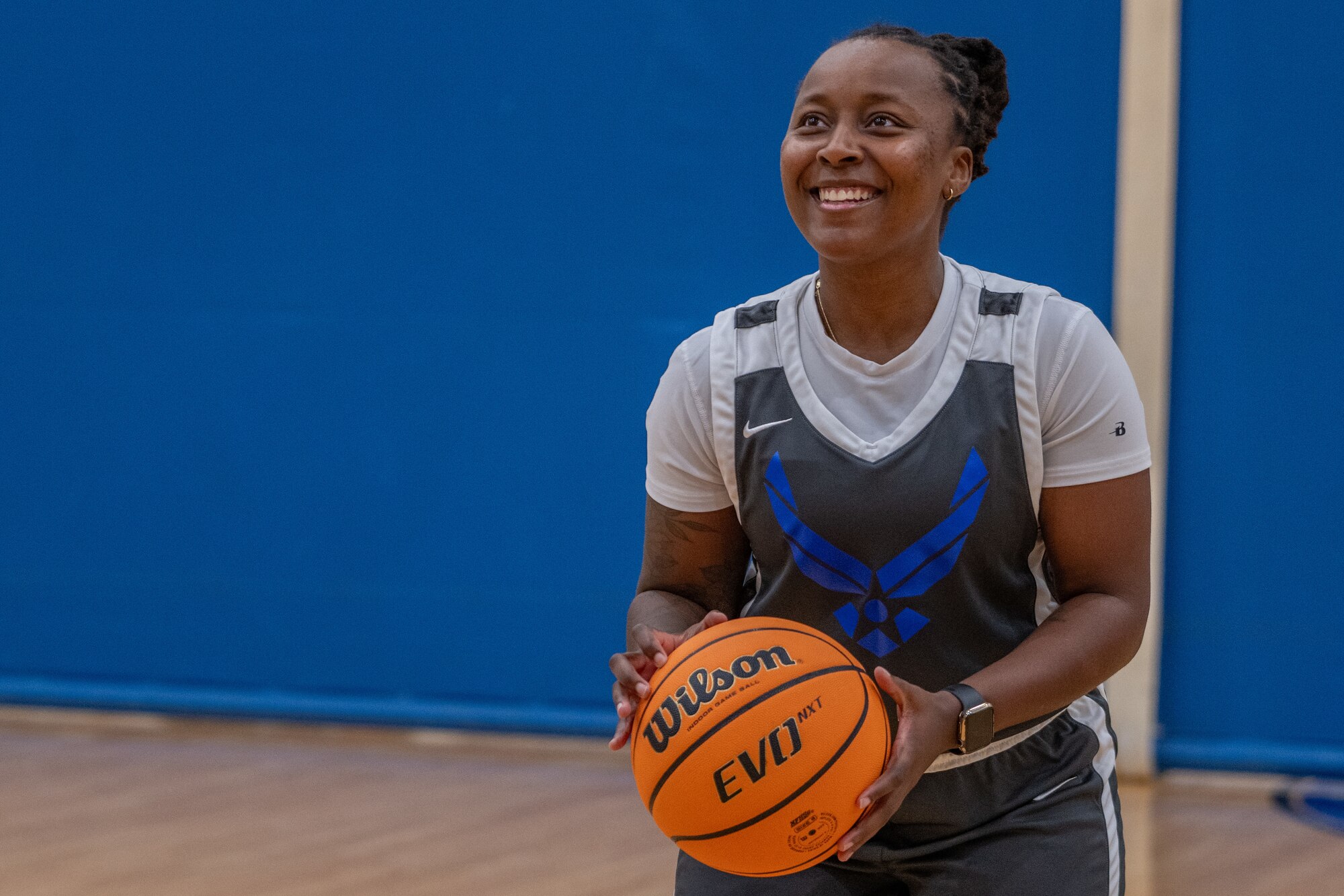 Person holding a basketball