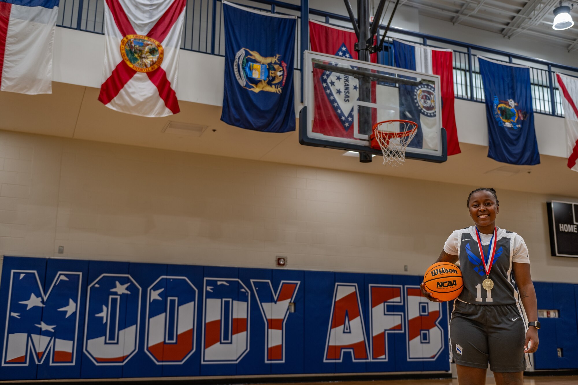 Person holding a basketball