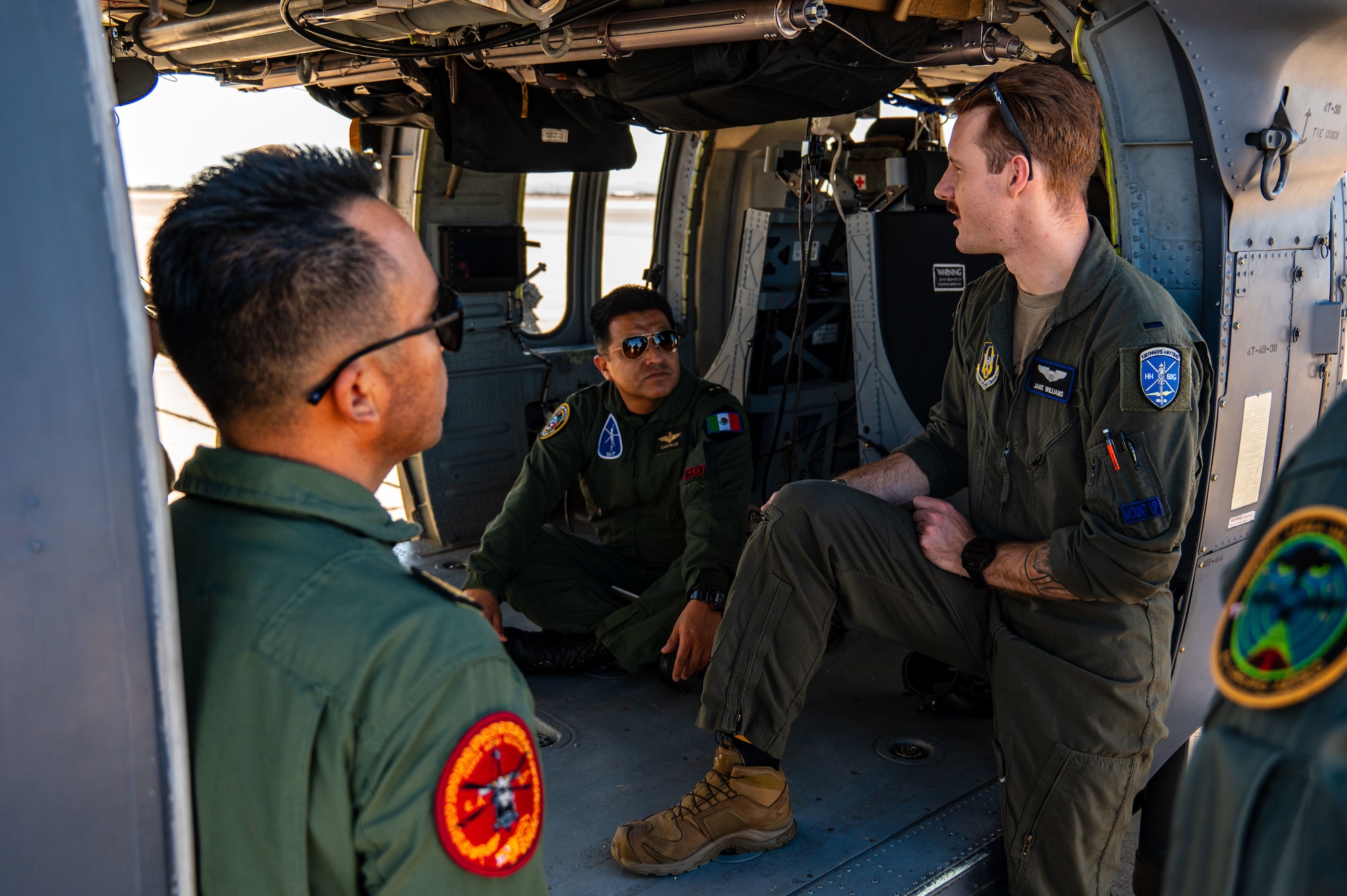 Photos of airplanes and crews participating in AMALGAM EAGLE 2024, a live-fly air defense exercise
