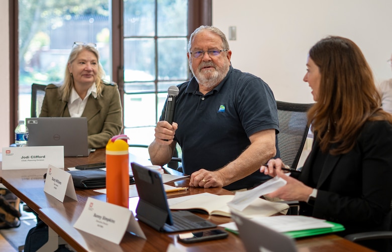 Dusty Williams, technical adviser with the National Association of Flood and Stormwater Management Agencies, center, provides his portion of opening remarks Nov. 7 during the 2024 Seven Counties Flood-Control Directors Meeting at the LA District Baseyard in South El Monte, California.