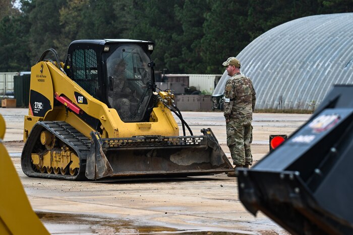 A Citizen Airman assigned to the 910th Civil Engineer Squadron operates a skid steer loader at Dobbins Air Reserve Base, Georgia, Nov. 14, 2024.