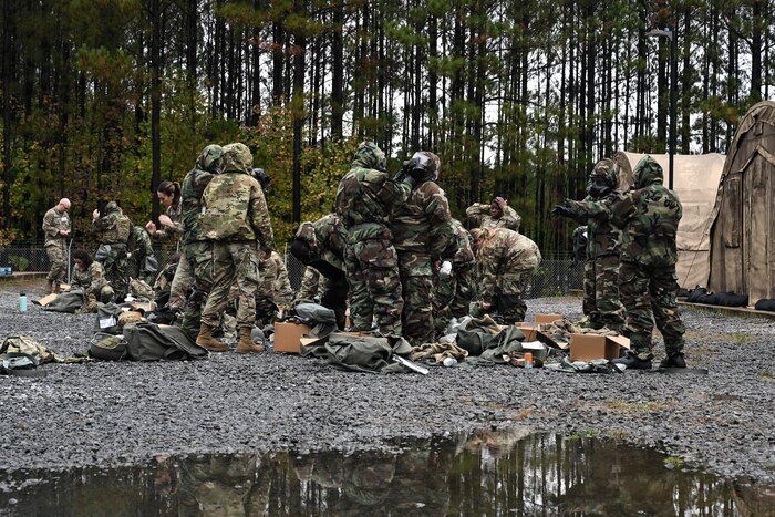Citizen Airmen assigned to the 910th Airlift Wing practice dawning their mission-oriented protective posture gear at Dobbins Air Reserve Base, Georgia, Nov. 14, 2024.