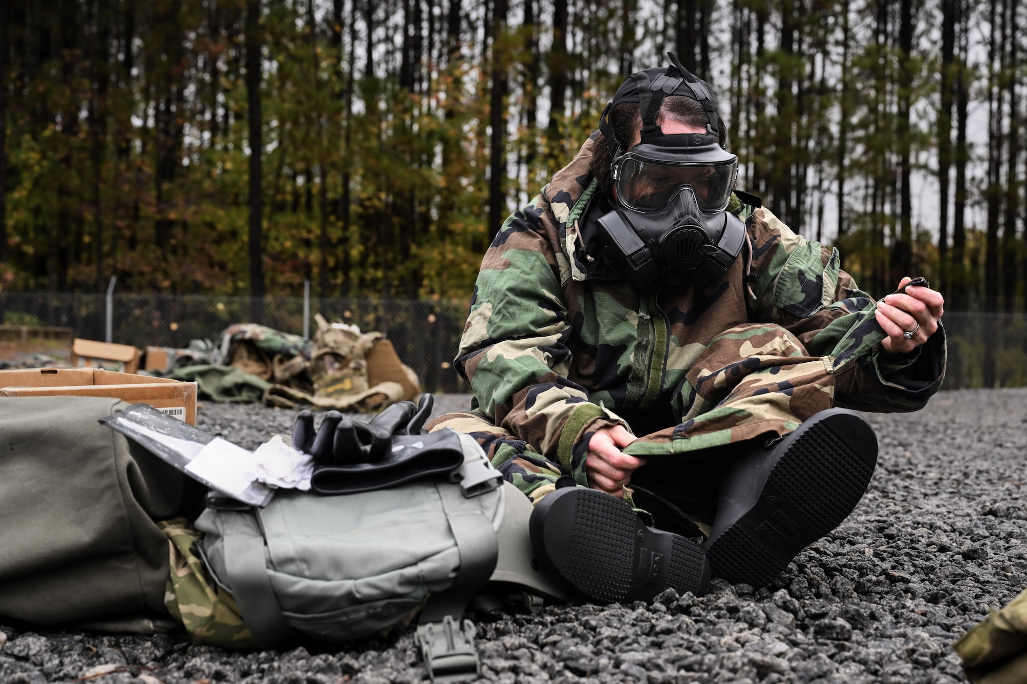 A Citizen Airman assigned to the 910th Airlift Wing adjusts their pant straps during a Chemical, Biological, Radiological, Nuclear and high-yield Explosives class at Dobbins Air Reserve Base, Georgia, Nov. 14, 2024.