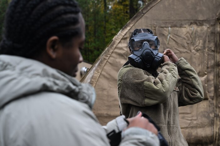 A Citizen Airman assigned to the 910th Airlift Wing tightens their gas mask during a Chemical, Biological, Radiological, Nuclear and high-yield Explosives class at Dobbins Air Reserve Base, Georgia, Nov. 14, 2024.