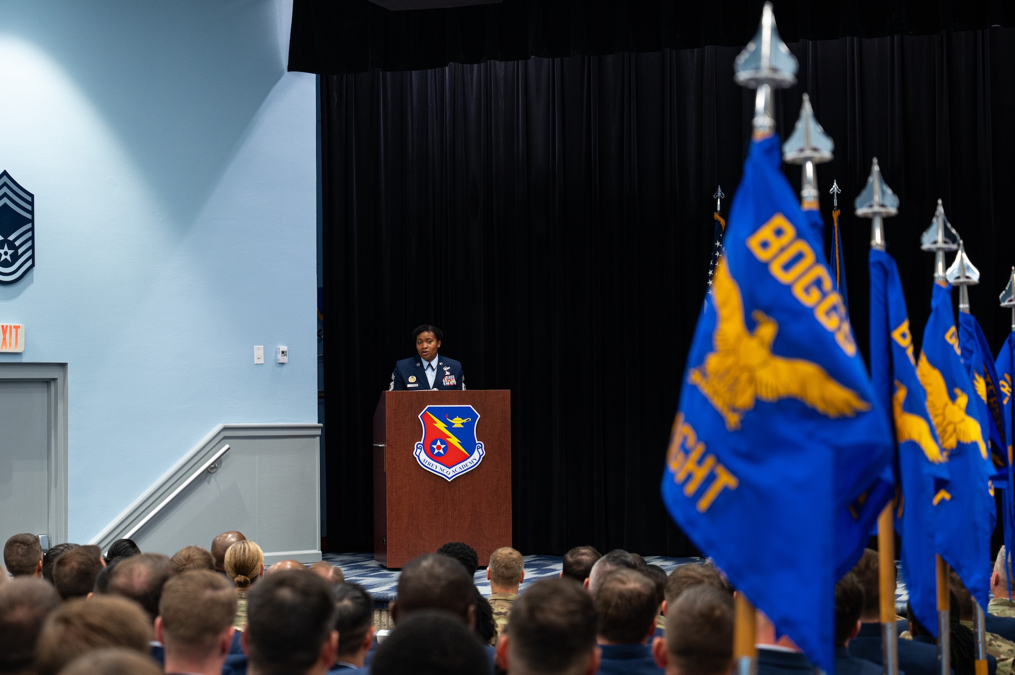 Graduation photo with Chief Pollard speaking