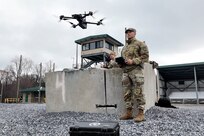 The capabilities of the 166th Regiment - Regional Training Institute's 1st and 2nd Battalions melded during a unique artillery live-fire training exercise Nov. 15, 2024 at Fort Indiantown Gap, Pa. Forward observers with 1st Battalion used several models of Small Unmanned Aircraft Systems (SUAS) to acquire targeting data of identified targets. This data was used to submit a call for fire to instructors and students with 2nd Battalion, who engaged the targets with artillery fire using M119, M777, and M109A6 howitzers. (U.S. Army National Guard photo by Sgt. 1st Class Shane Smith)
