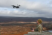 Sgt. 1st Class Richard Hutnik, quality assurance noncommissioned officer for the 166th Regiment – Regional Training Institute’s 1st Battalion, uses a drone to acquire targeting data Nov. 15, 2024, at Fort Indiantown Gap, Pa. This data was used to submit a call for fire to instructors and students with 2nd Battalion, who engaged the targets with artillery fire using M119, M777, and M109A6 howitzers. (Pennsylvania National Guard photo by Brad Rhen)
