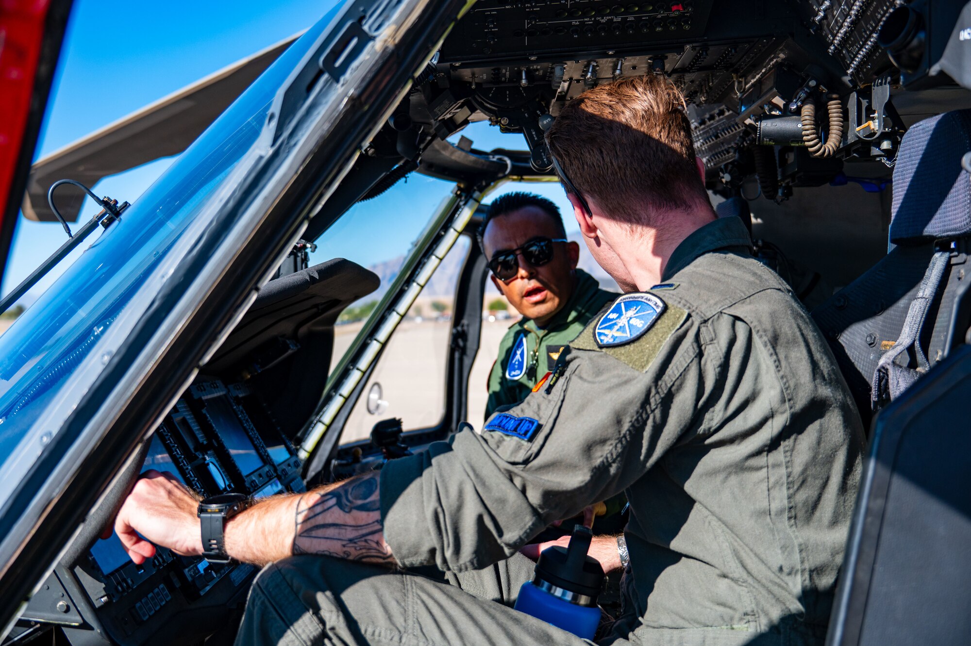 Photos of airplanes and crews participating in AMALGAM EAGLE 2024, a live-fly air defense exercise