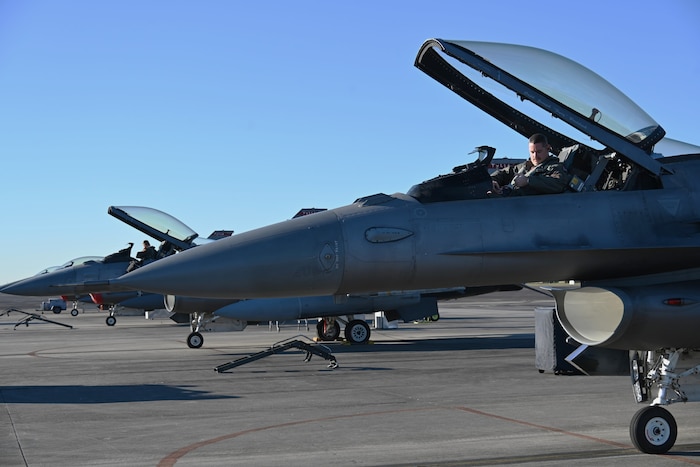 Photos of airplanes and crews participating in AMALGAM EAGLE 2024, a live-fly air defense exercise