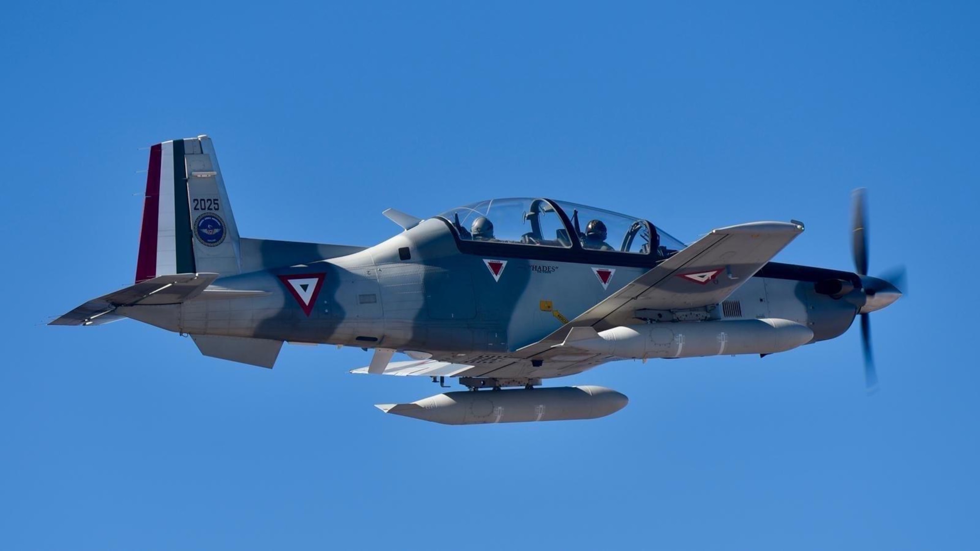 Photos of airplanes and crews participating in AMALGAM EAGLE 2024, a live-fly air defense exercise