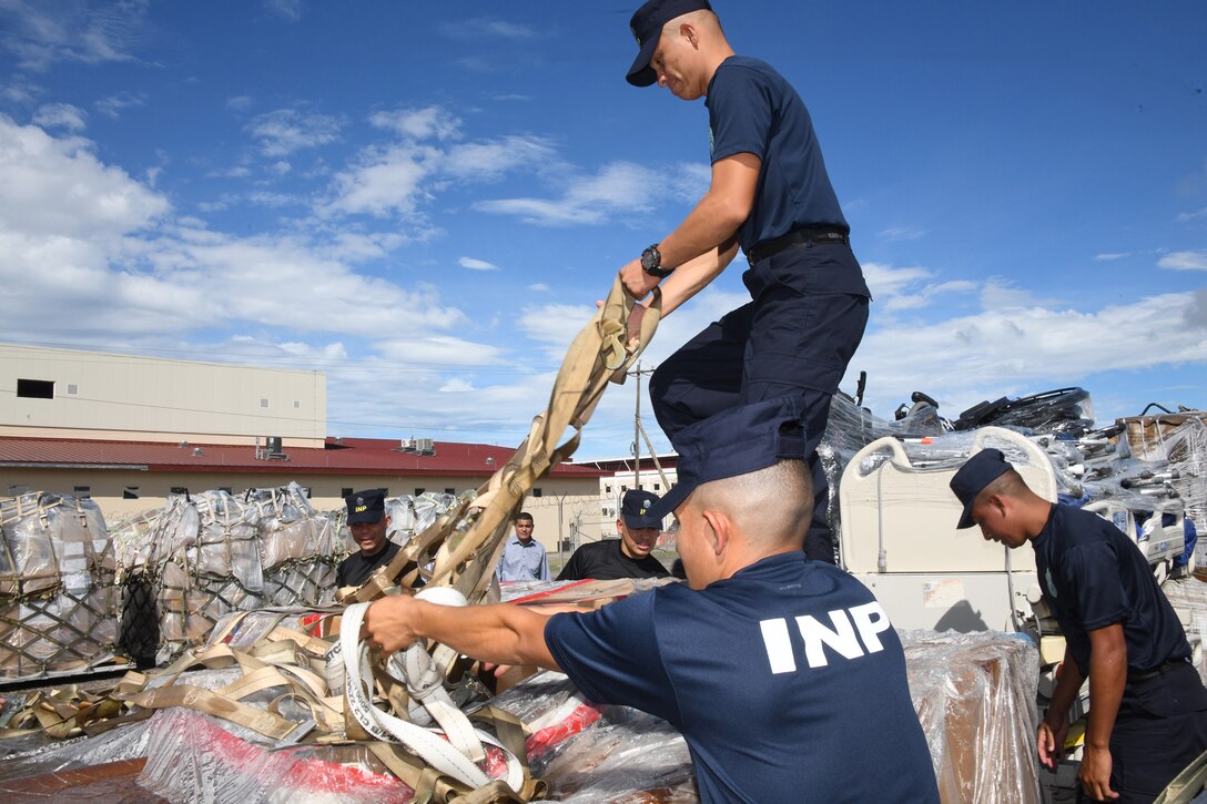 Members from Instituto Nacional Penitenciario prepare humanitarian aid for pickup from Soto Cano Air base, Honduras, Nov. 18, 2024. Over the last year, Soto Cano Air Base has received 41 shipments through the Denton Program valuing more than 1.8 million dollars. (U.S. Army courtesy photo)