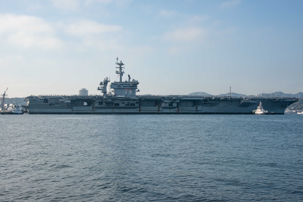 Nimitz-class aircraft carrier USS George Washington (CVN 73), pulls into Commander, Fleet Activities Yokosuka. George Washington is 7th Fleet's premier forward-deployed aircraft carrier, a long-standing symbol of the United States' commitment to maintaining a free and open Indo-Pacific region, while operating alongside Allies and partners across the U.S. Navy's largest numbered fleet.