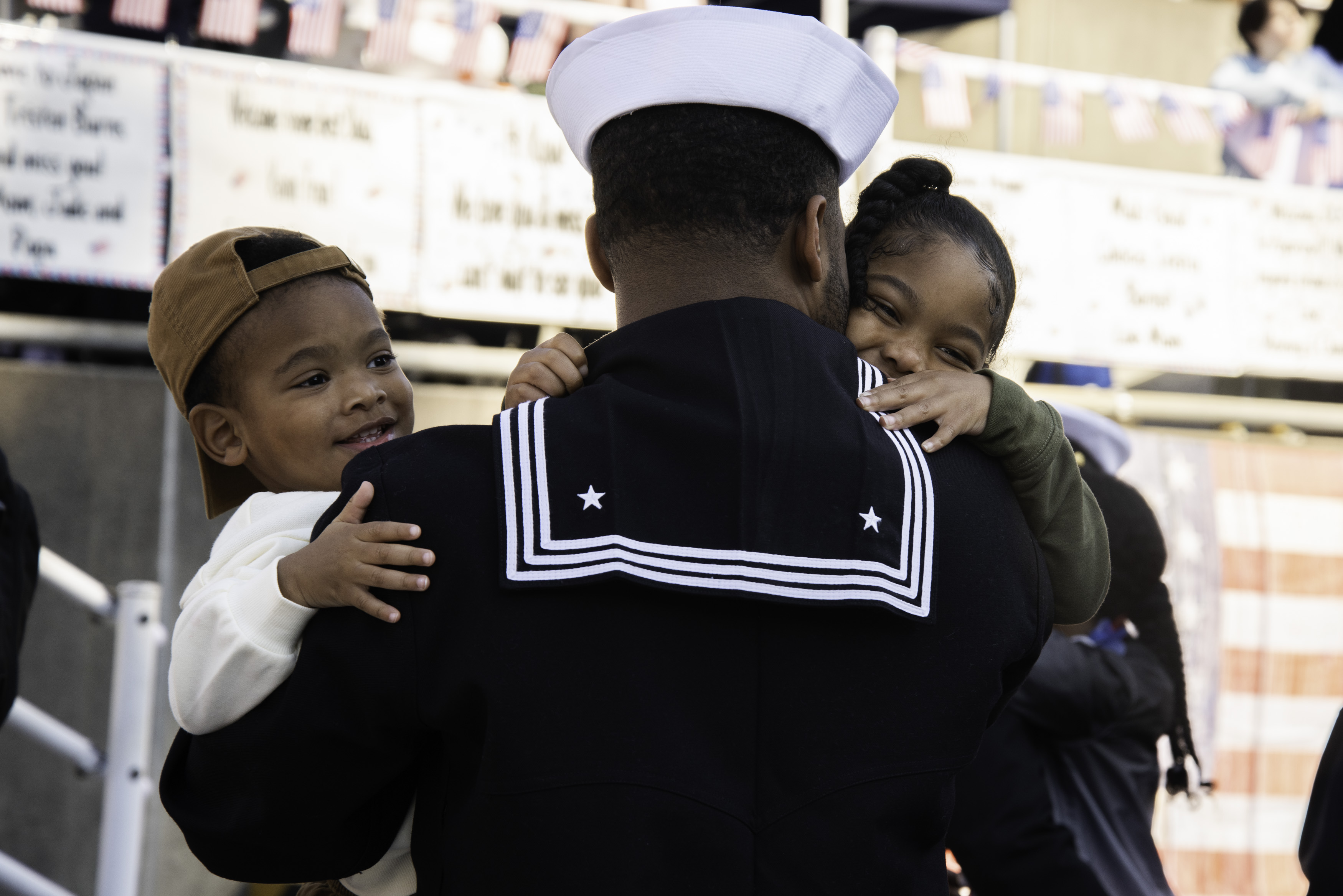 Sailors assigned to the Nimitz-class aircraft carrier USS George Washington (CVN 73) embraced family members on the pier during a homecoming onboard Commander, Fleet Activities Yokosuka Friday, November 22. George Washington returned to Yokosuka for the first time in almost nine years after turning over with USS Ronald Reagan (CVN 76) as the Navy’s only permanently forward-deployed aircraft carrier. George Washington is 7th Fleet's premier forward-deployed aircraft carrier, a long-standing symbol of the United States' commitment to maintaining a free and open Indo-Pacific region, while operating alongside Allies and partners across the U.S. Navy's largest numbered fleet.