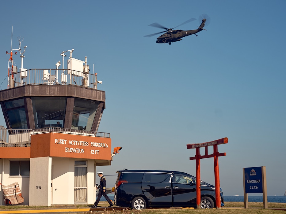 A U.S. Army UH-60 Black Hawk departs Commander, Fleet Activities Yokosuka's Chess Romeo helopad Friday, November 22 following the arrival of USS George Washington (CVN 73). The Black Hawk, assigned to U.S. Army Japan, brought U.S. Ambassador to Japan Rahm Emmanuel to the Navy installation.